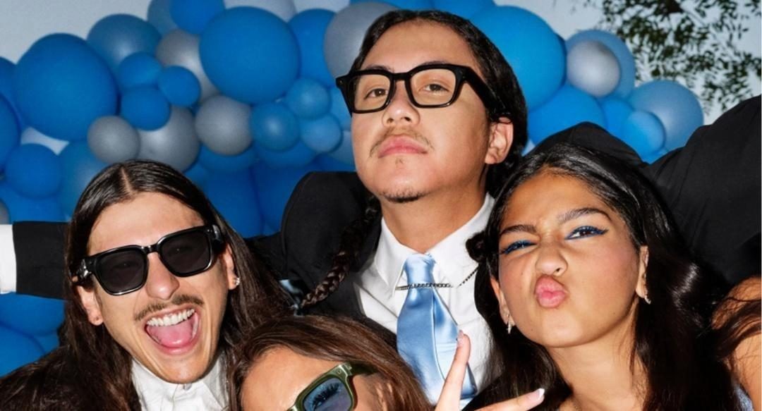 People wearing smart glasses at a social gathering