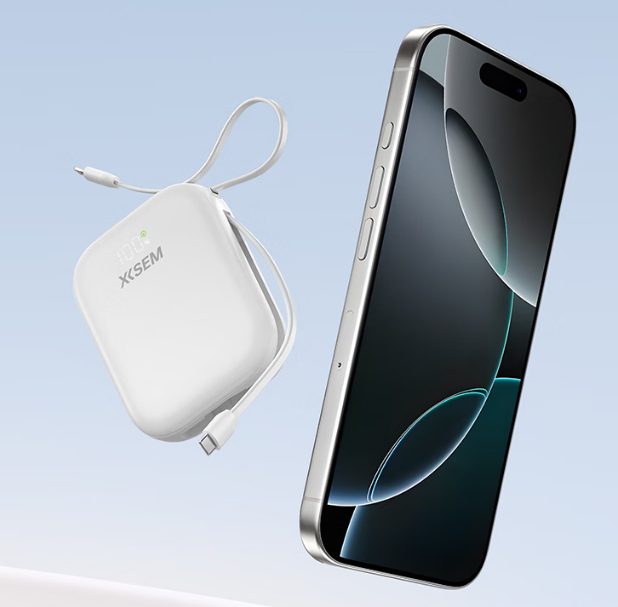 A slim power bank connected to a smartphone