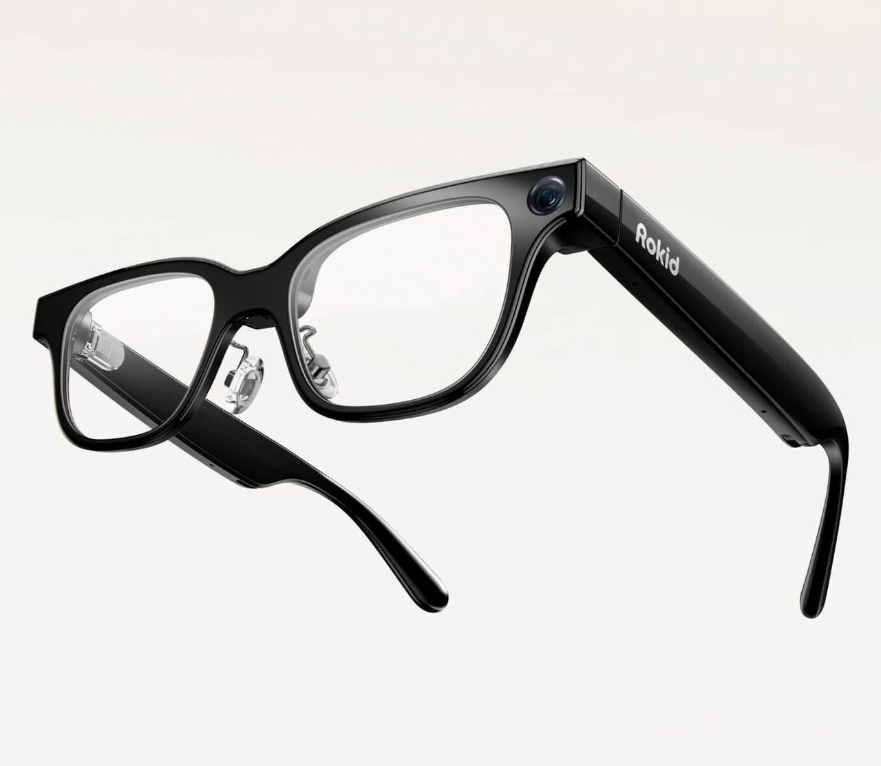 A dark-framed pair of smart glasses with clear lenses