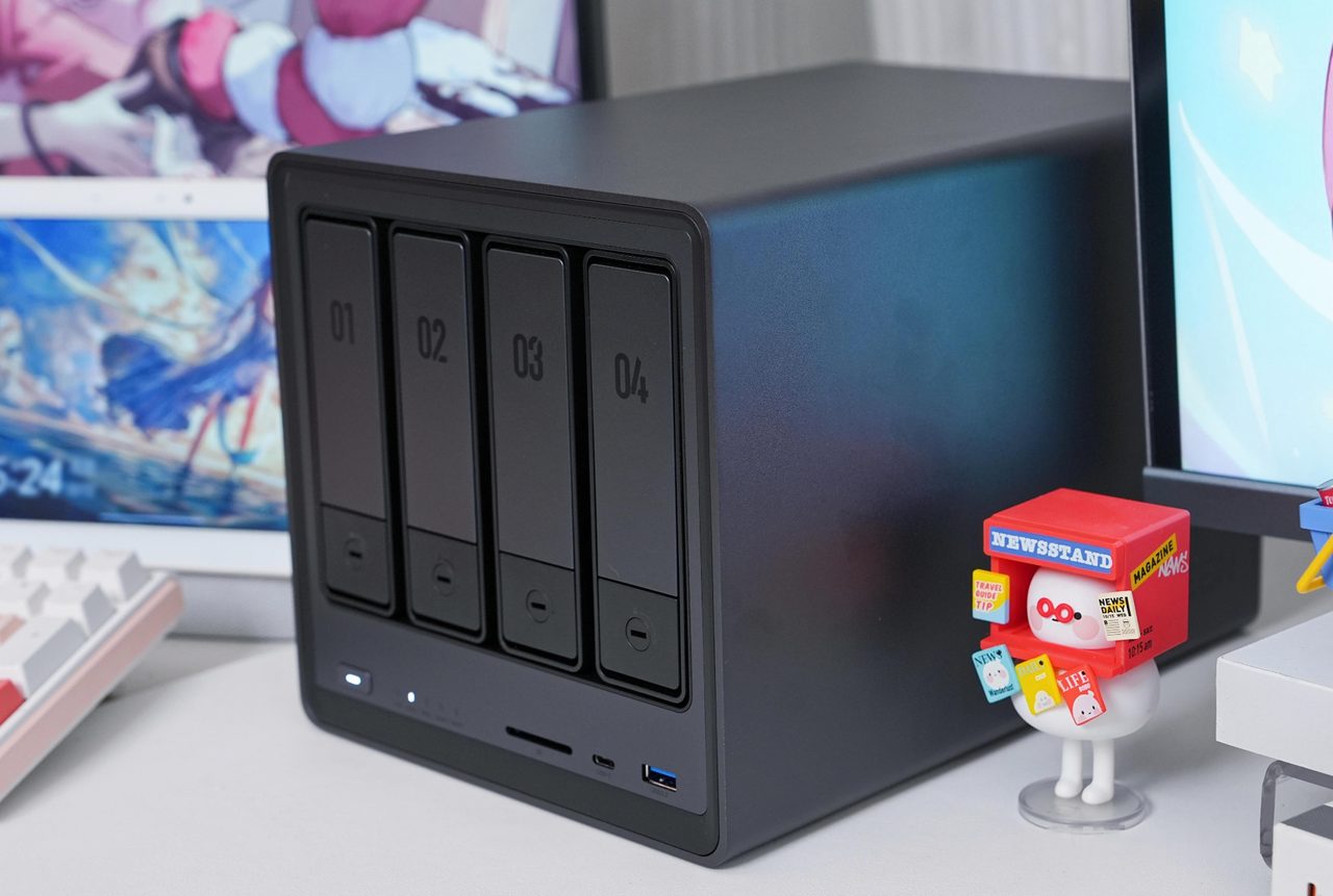 A four-bay NAS enclosure shown front-on with its drive sleds numbered one to four