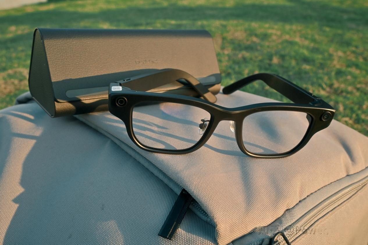 Smart glasses placed on top of a notebook