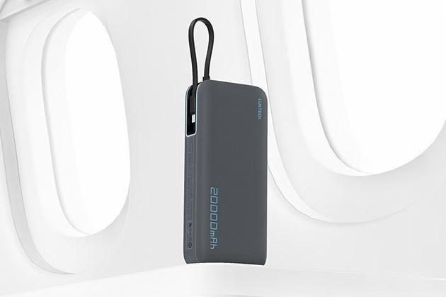 A dark power bank with an integrated carry handle