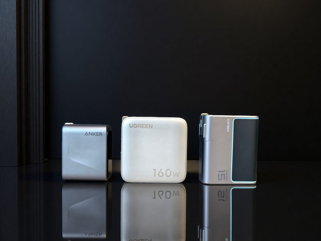 Three white multi-port USB-C wall chargers photographed together