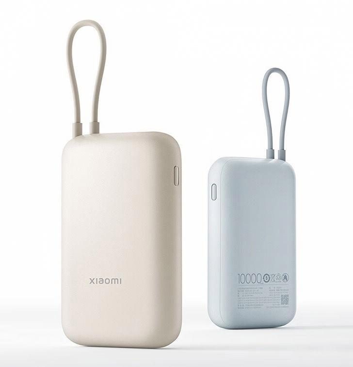 Two power banks with lanyard loops on a plain background