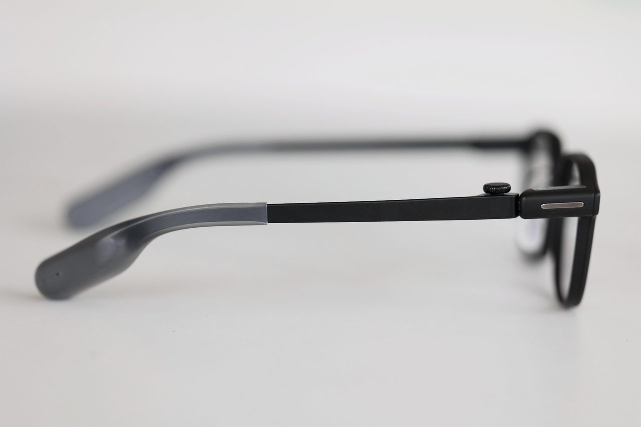 Side view of the temple arm of a smart glasses frame