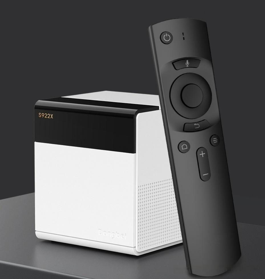 A small television streaming box with its remote control