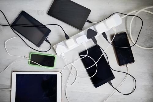 Three devices charging simultaneously from one charger